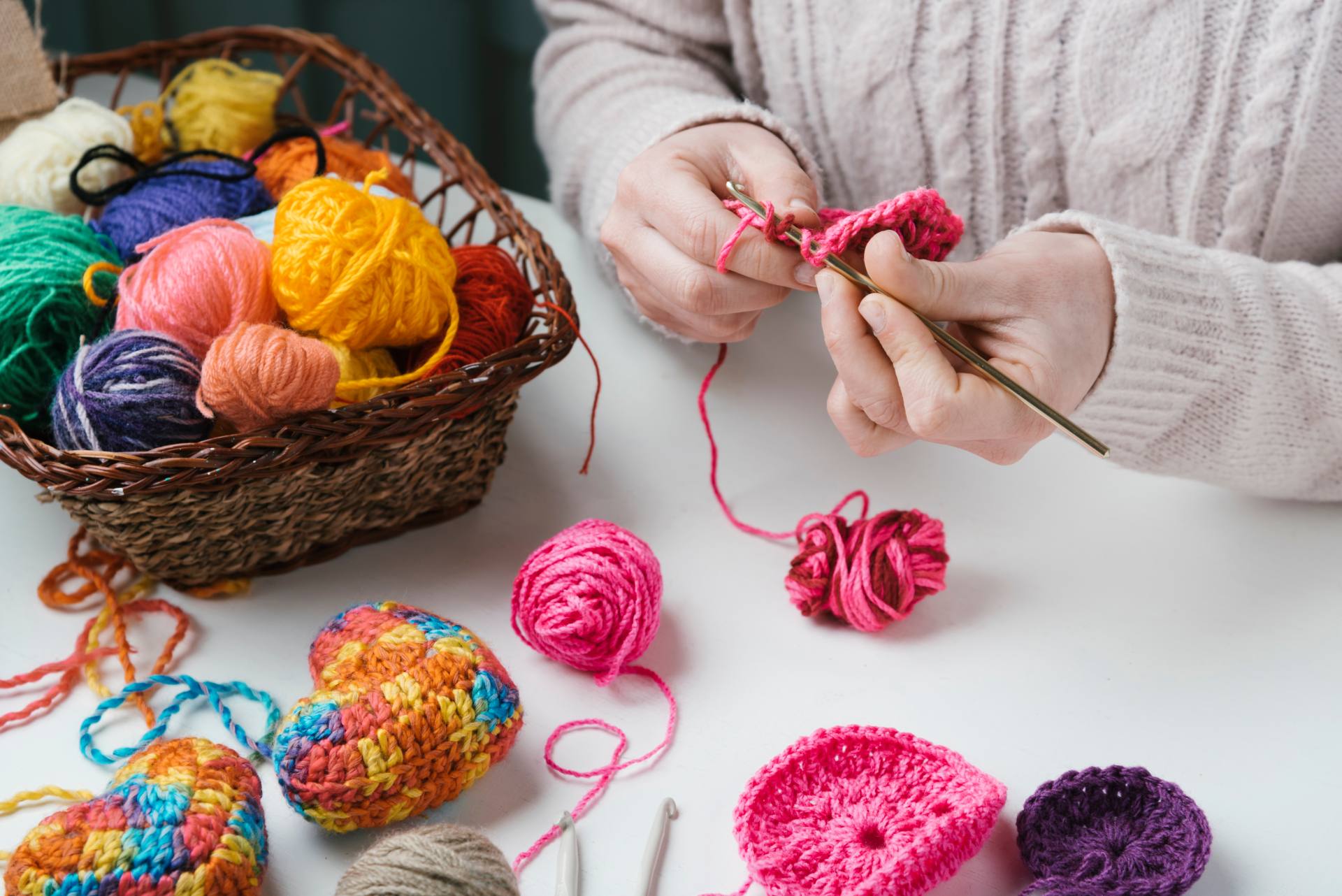 Colorful yarn, crochet hooks
